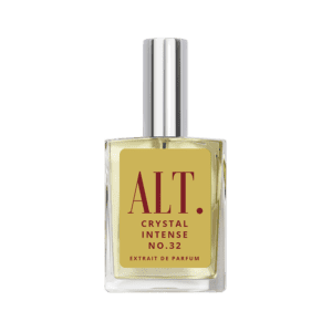A bottle of perfume on a green background.
