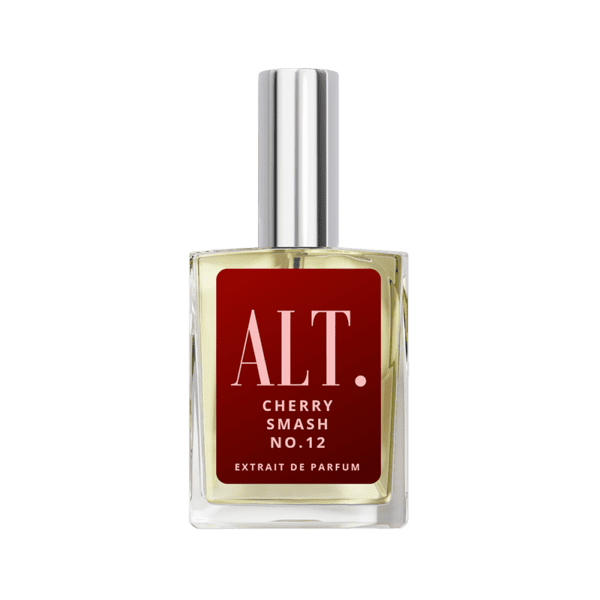 A bottle of perfume on a green background.