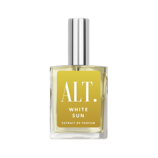 A bottle of perfume on a green background.