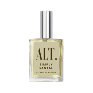 A bottle of perfume on a green background.