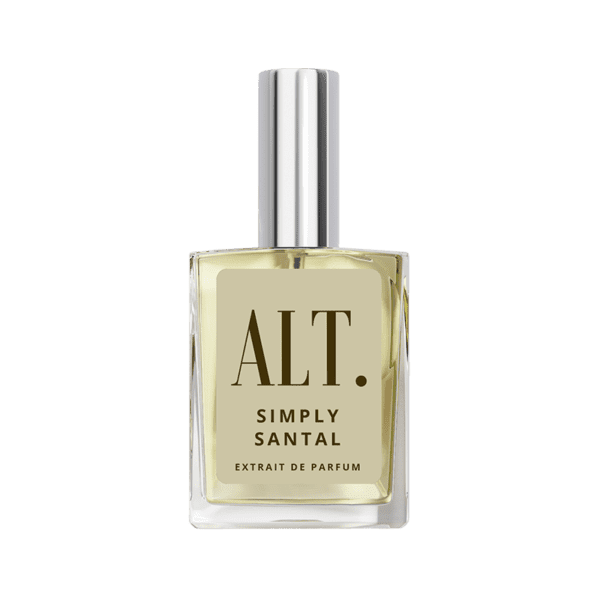 A bottle of perfume on a green background.