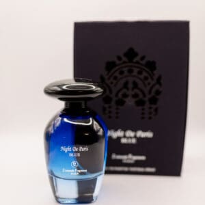 Blue perfume bottle with elegant packaging.