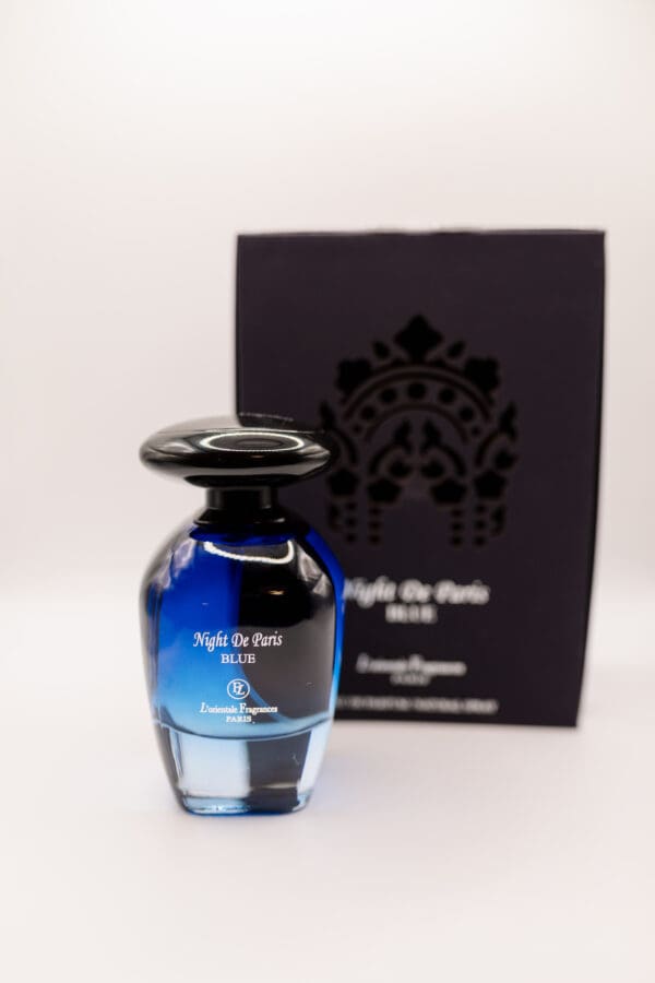 Blue perfume bottle with elegant packaging.