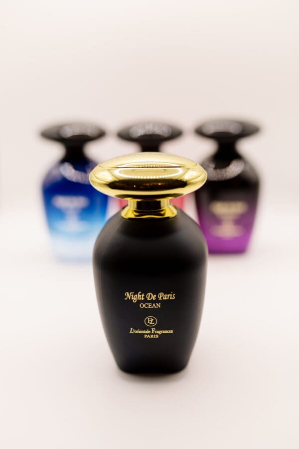 Black perfume bottle with gold accents.