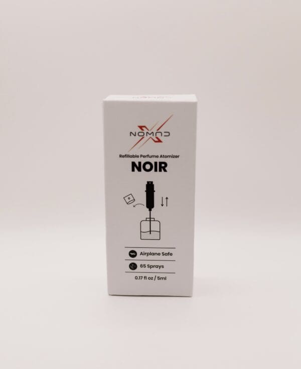 Refillable perfume atomizer packaging, labeled NOIR.