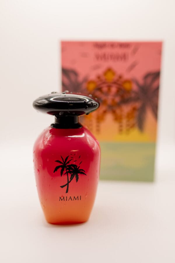 Perfume bottle with palm trees design.